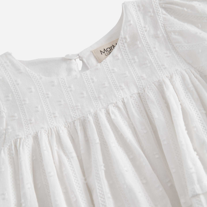 Sold at Bombon shop, designed by Mar Mar Copenhagen, Ritona baby bodysuit in White with puff sleeves