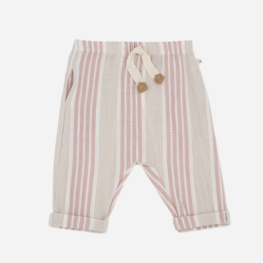 Sold at Bombon shop, designed by 1+ in the family brand, these striped pants for baby girls and toddlers is ideal for spring and summer. front view