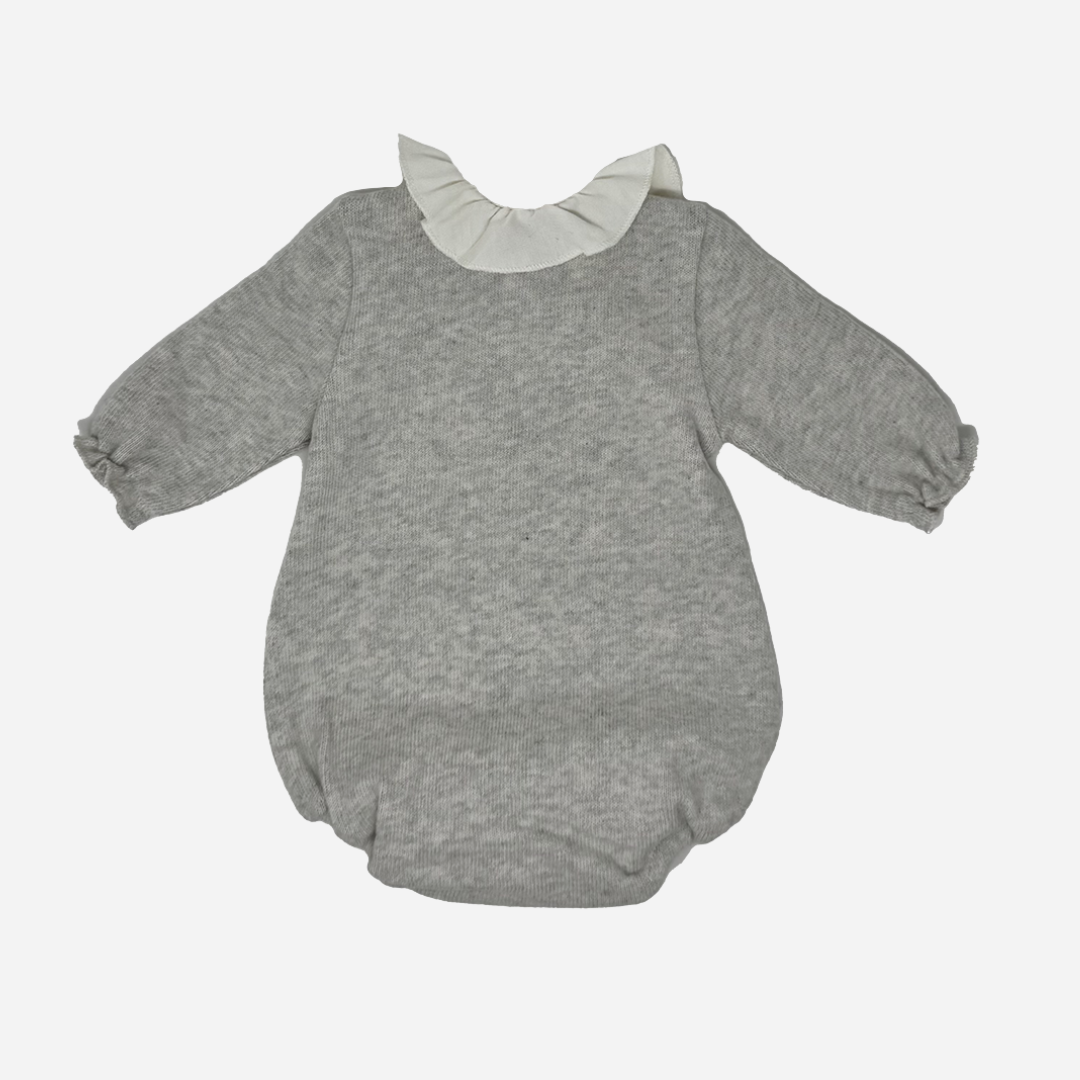 Sold at Bombon shop, designed by Tiny Soul — soft grey knit baby bodysuit with long sleeves and an ivory ruffled collar. back