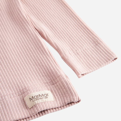 Sold at Bombon shop, designed by MarMar Copenhagen — blush pink ribbed organic cotton long-sleeve baby top, part of a matching set.