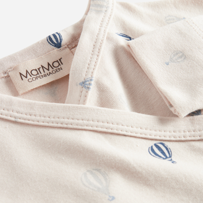 Sold at Bombon shop, designed by MarMar Copenhagen. Cream baby hat with blue air balloon print, pairs perfectly with the matching air balloon footie and blanket.