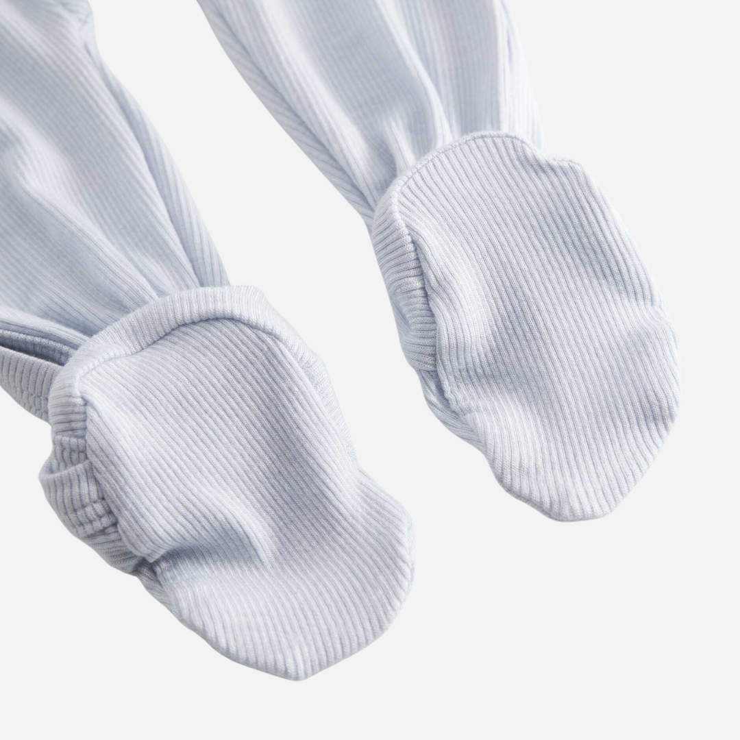 Sold at Bombon shop, designed by Mar Mar Copenhagen, Rubello modal footed baby onesie in Blue Mist ribbed fabric