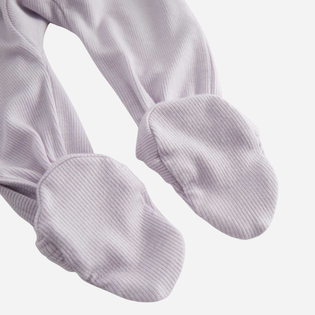 Sold at Bombon shop, designed by Mar Mar Copenhagen, Rubello modal footed baby onesie in Sweet Violet ribbed fabric