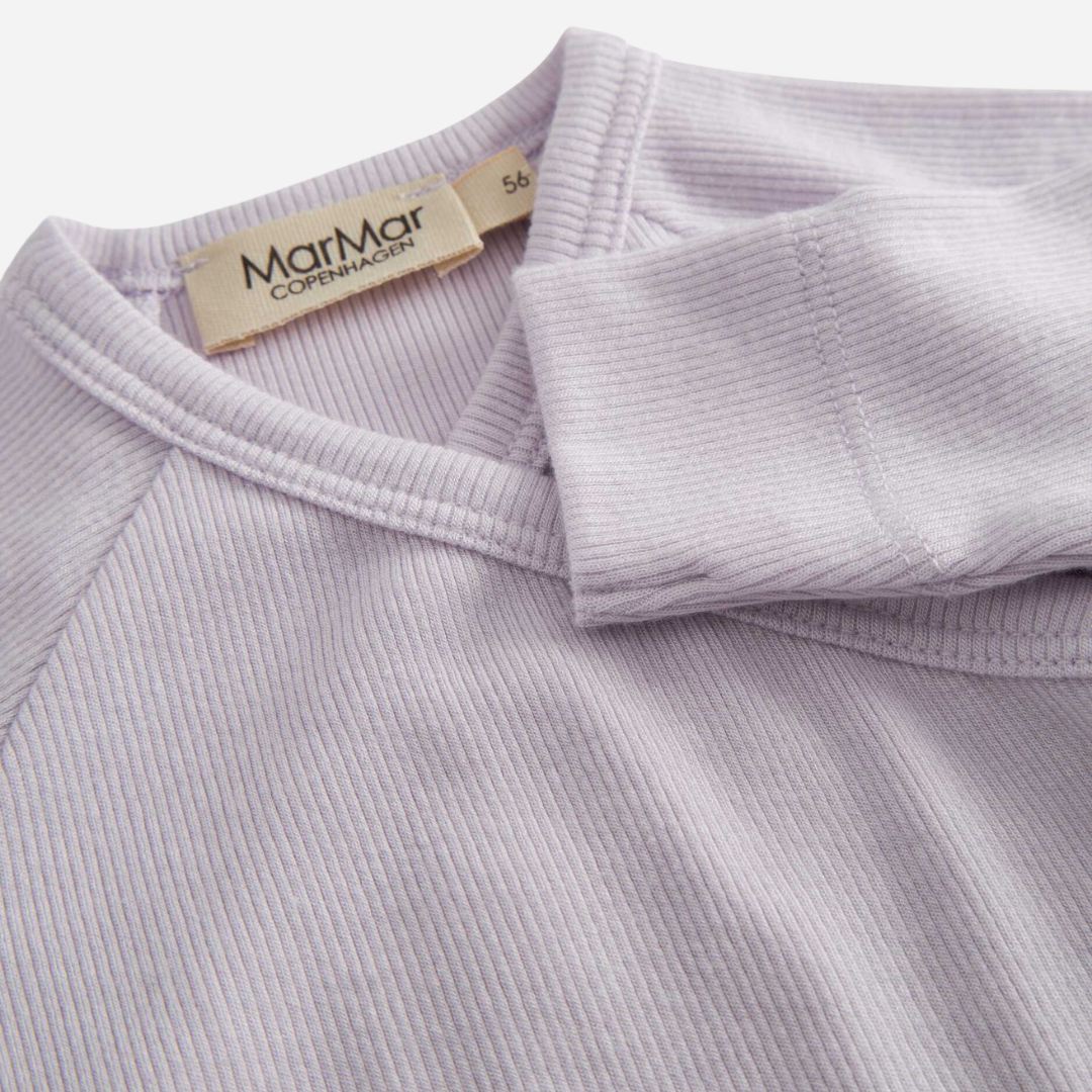 Sold at Bombon shop, designed by Mar Mar Copenhagen, Rubello modal footed baby onesie in Sweet Violet ribbed fabric