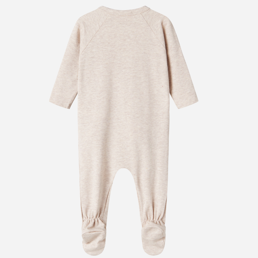 Sold at Bombon shop, designed by MarMar Copenhagen — beige organic cotton footed baby onesie with side tie closure.