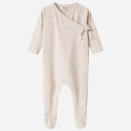 Sold at Bombon shop, designed by MarMar Copenhagen — beige organic cotton footed baby onesie with side tie closure.