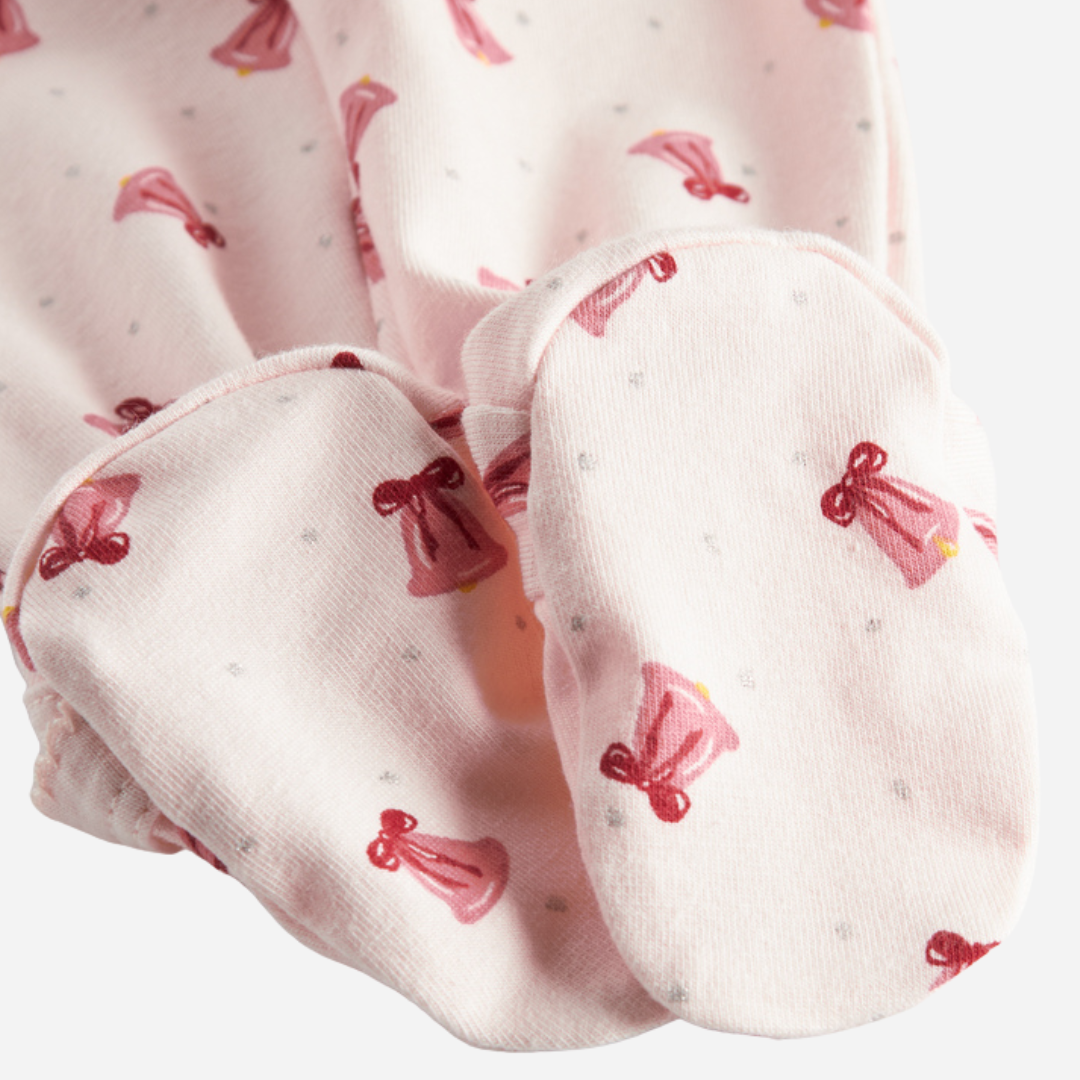 Sold at Bombon shop, designed by MarMar Copenhagen. Blush pink baby wrap footie with delicate pink bell print, pairs perfectly with the matching hat and blanket.