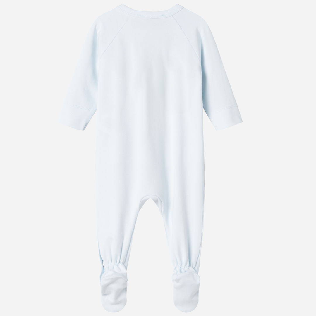 Sold at Bombon shop, designed by MarMar Copenhagen — powder blue organic cotton footed baby onesie with side tie closure.