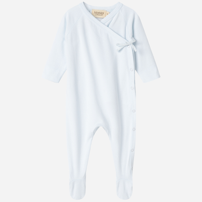 Sold at Bombon shop, designed by MarMar Copenhagen — powder blue organic cotton footed baby onesie with side tie closure.