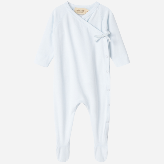 Sold at Bombon shop, designed by MarMar Copenhagen — powder blue organic cotton footed baby onesie with side tie closure.
