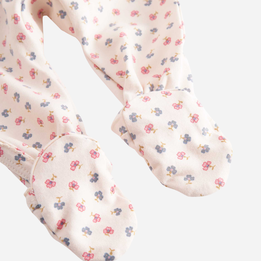 Sold at Bombon shop, designed by Mar Mar Copenhagen, Rubetta footed baby onesie in Mini Flower print modal and organic cotton blend