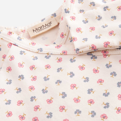 Sold at Bombon shop, designed by Mar Mar Copenhagen, Rubetta footed baby onesie in Mini Flower print modal and organic cotton blend