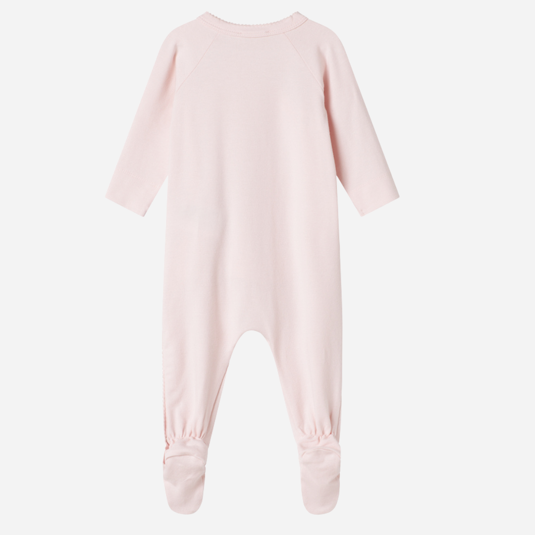 Sold at Bombon shop, designed by MarMar Copenhagen — blush pink organic cotton footed baby onesie with side tie closure.