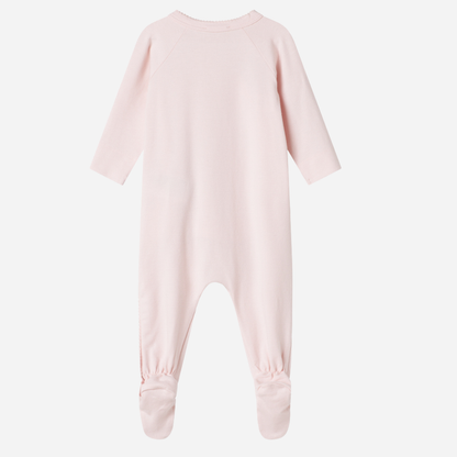 Sold at Bombon shop, designed by MarMar Copenhagen — blush pink organic cotton footed baby onesie with side tie closure.