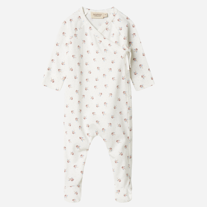 Sold at Bombon shop, designed by MarMar Copenhagen — white organic cotton baby onesie with floral print and side-tie closure, part of a matching set.