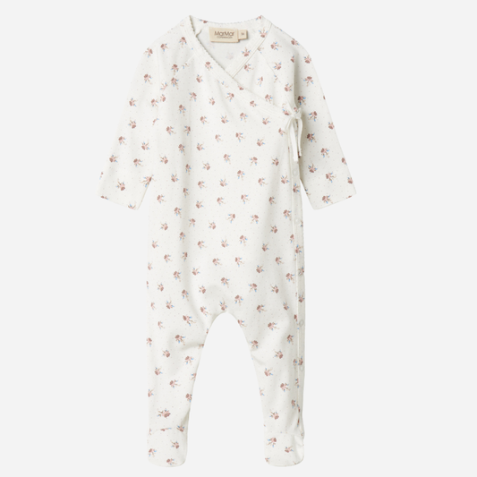 Sold at Bombon shop, designed by MarMar Copenhagen — white organic cotton baby onesie with floral print and side-tie closure, part of a matching set.
