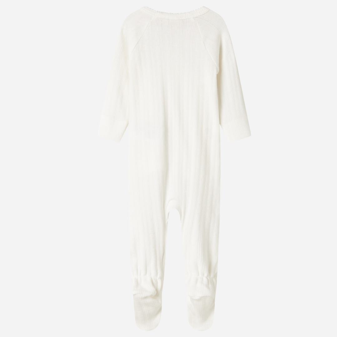 Sold at Bombon shop, designed by MarMar Copenhagen. Cream white ribbed baby wrap footie with side tie, pairs perfectly with the matching hat and blanket.