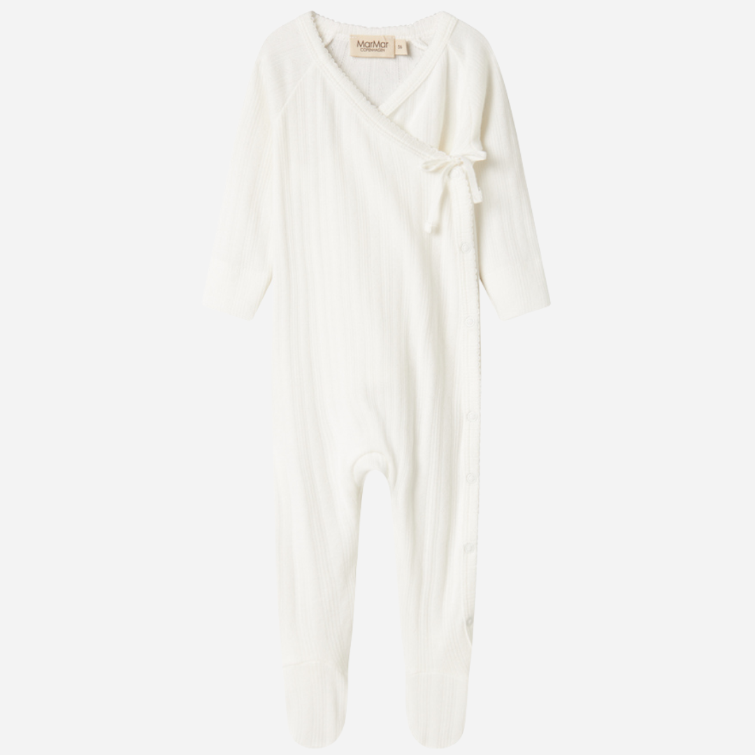 Sold at Bombon shop, designed by MarMar Copenhagen. Cream white ribbed baby wrap footie with side tie, pairs perfectly with the matching hat and blanket.