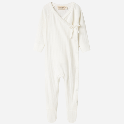 Sold at Bombon shop, designed by MarMar Copenhagen. Cream white ribbed baby wrap footie with side tie, pairs perfectly with the matching hat and blanket.