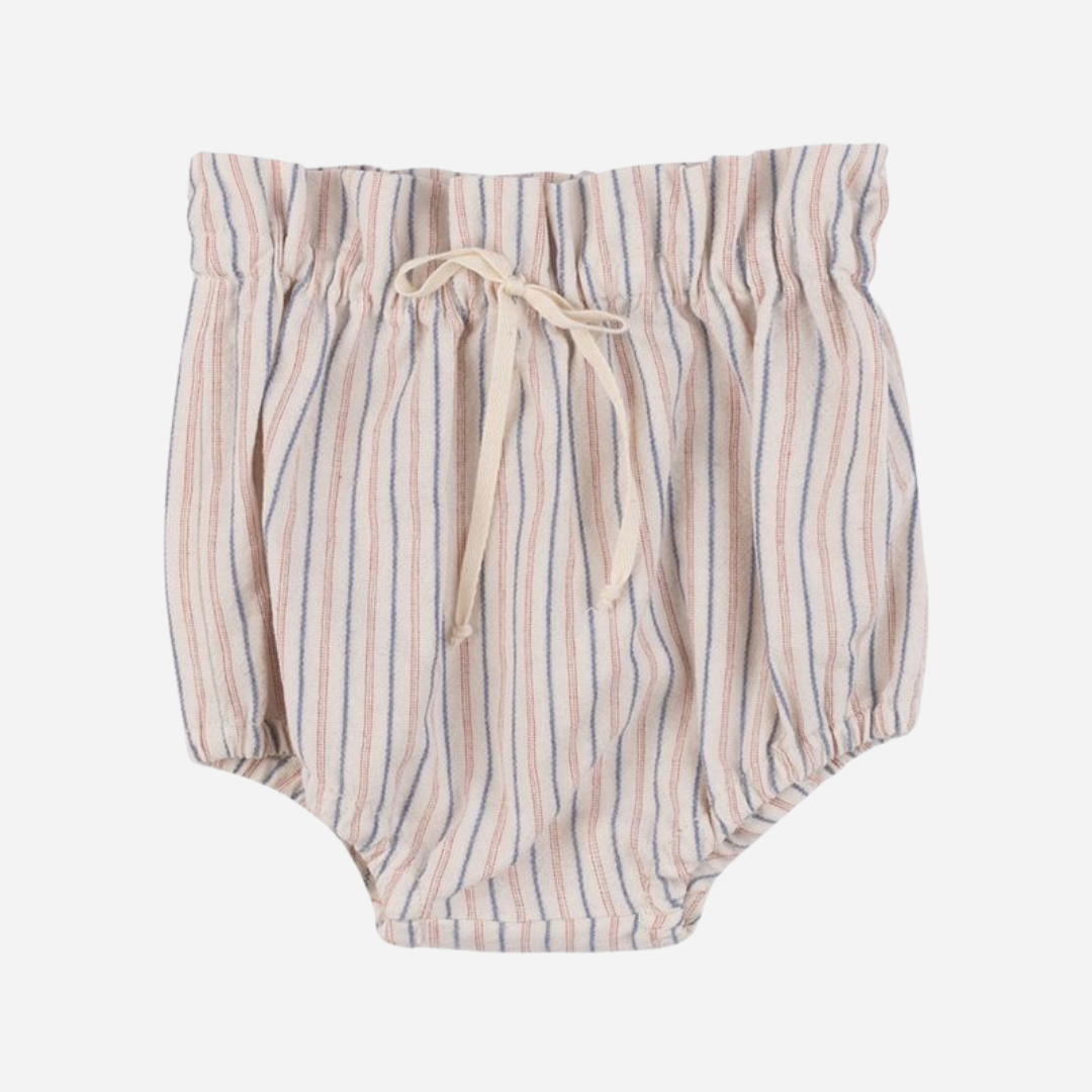 Sold at Bombon Shop, designed by Babe & Tess, striped baby bloomers in lightweight cotton with blue and terracotta stripes, elastic paperbag waist, decorative tie detail, and gathered leg openings.