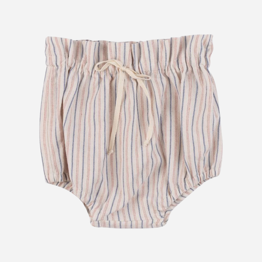 Sold at Bombon Shop, designed by Babe & Tess, striped baby bloomers in lightweight cotton with blue and terracotta stripes, elastic paperbag waist, decorative tie detail, and gathered leg openings.
