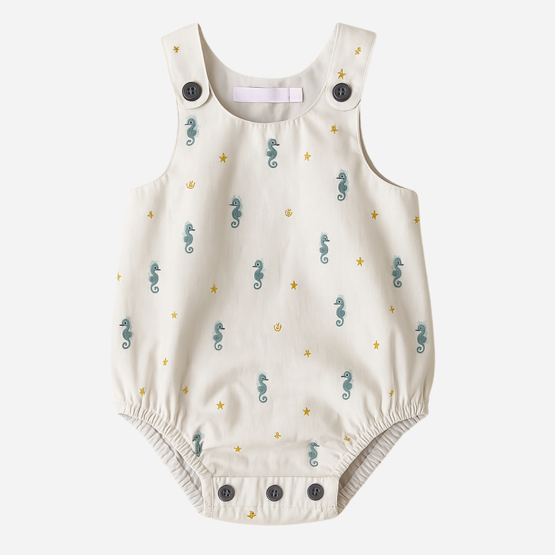 sold at Bombon shop, designed by Paloma de la O brand, this sea horse print baby romper for baby boys is ideal for spring and summer. front view
