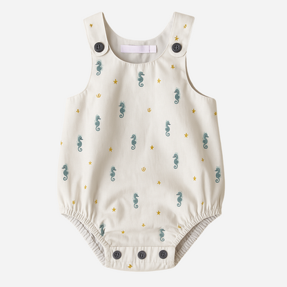 sold at Bombon shop, designed by Paloma de la O brand, this sea horse print baby romper for baby boys is ideal for spring and summer. front view
