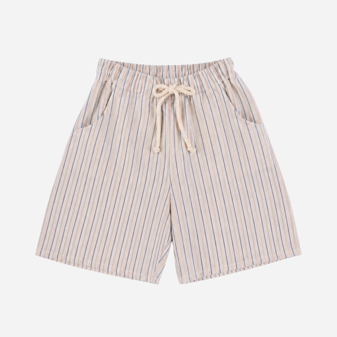 Sold at Bombon Shop, designed by Babe & Tess, striped Bermuda shorts in lightweight cotton with blue and terracotta stripes, elastic waistband, adjustable drawstring, front pockets, and relaxed fit for boys.