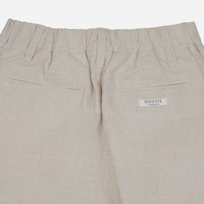 Sold at Bombon shop, designed by Donsje from Amsterdam, these baby and toddler trousers in warm white go with everything and are unisex. Perfect for pre fall all the way through winter.  top back view