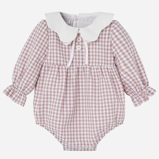 Sold at Bombon shop, designed by Paz Rodriguez, beige gingham baby romper with white collar and long sleeves.