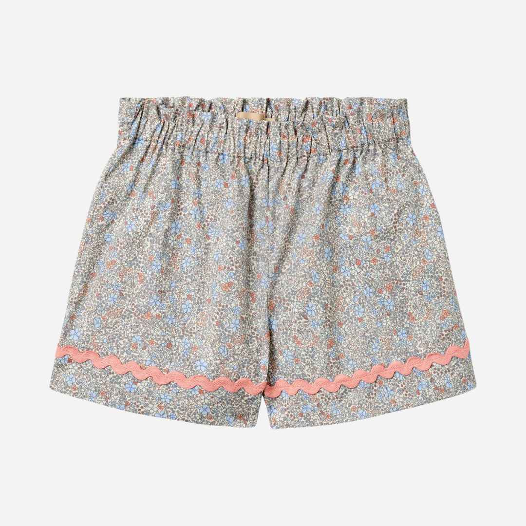 Sold at Bombon Shop, designed by Wheat, air blue flowers organic cotton baby shorts with lace hem detail and elastic waistband.