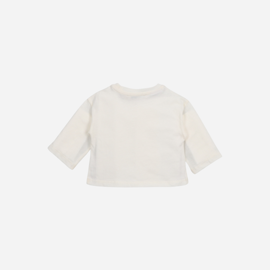 Sold at Bombon shop, this baby girl sweatshirt by The New Society features a cream base with a bold pink smiley face graphic and purple “The New Society” lettering, combining cozy comfort with playful, modern style. back