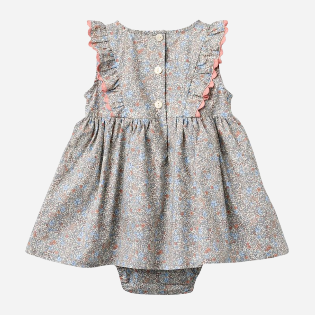 Sold at Bombon Shop, designed by Wheat, air blue flowers organic cotton baby dress with matching bloomers in soft blue floral print