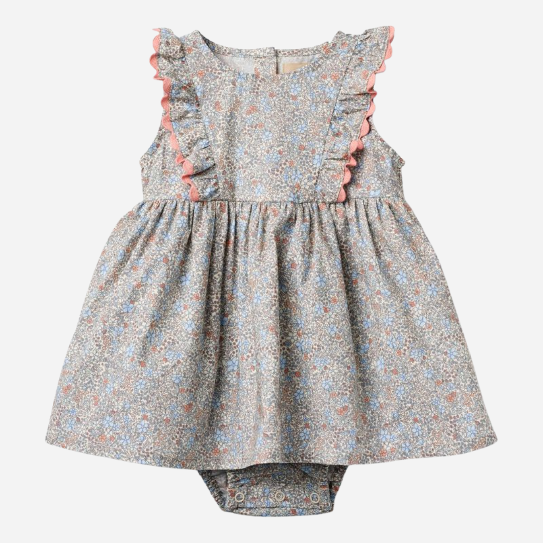 Sold at Bombon Shop, designed by Wheat, air blue flowers organic cotton baby dress with matching bloomers in soft blue floral print