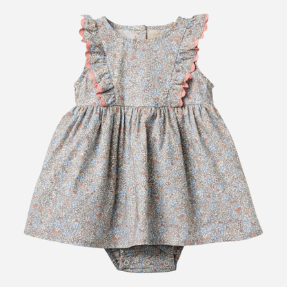 Sold at Bombon Shop, designed by Wheat, air blue flowers organic cotton baby dress with matching bloomers in soft blue floral print