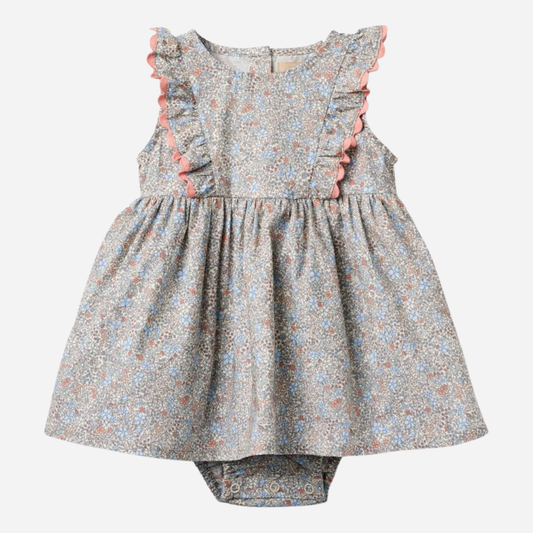Sold at Bombon Shop, designed by Wheat, air blue flowers organic cotton baby dress with matching bloomers in soft blue floral print