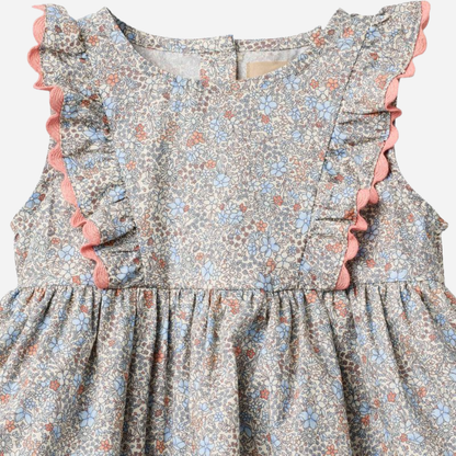 Sold at Bombon Shop, designed by Wheat, air blue flowers organic cotton baby dress with matching bloomers in soft blue floral print