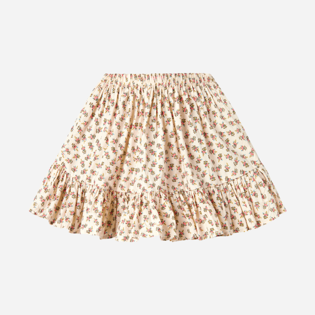 Sold at Bombon shop, designed by MarMar Copenhagen — floral cotton baby skirt with ruffled hem and elastic waistband, pairs perfectly with the matching knit cardigan.