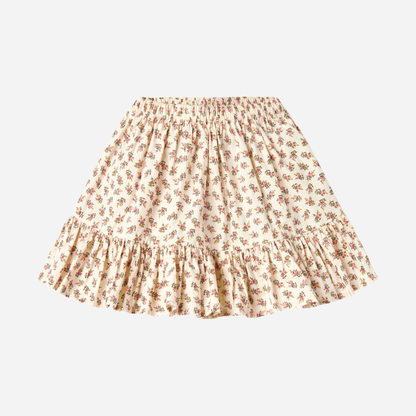 Sold at Bombon shop, designed by MarMar Copenhagen — floral cotton baby skirt with ruffled hem and elastic waistband, pairs perfectly with the matching knit cardigan.