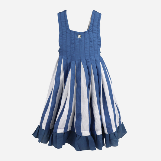 sold at bombon shop, designed by al agua patos brand, this blue and white striped dress for girls is perfect for spring and summer. front view