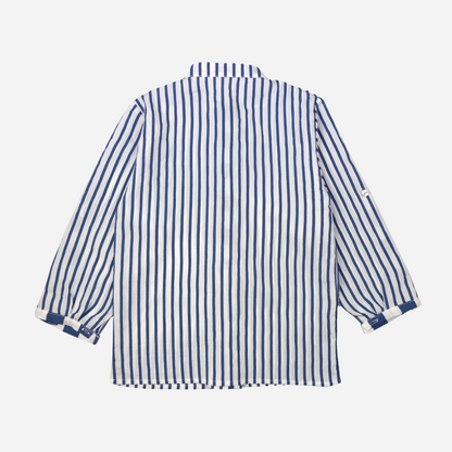 Sold at Bombon shop, designed by Al Agua Patos brand, this blue and white striped shirt for baby boys and toddlers perfect for spring and summer. back view