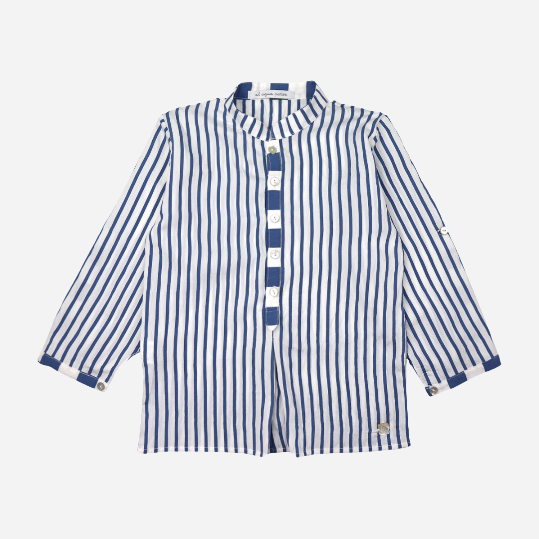 Sold at Bombon shop, designed by Al Agua Patos brand, this blue and white striped shirt for baby boys and toddlers perfect for spring and summer. Front view