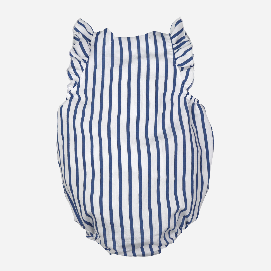 sold at Bombon shop, designed by Al Agua Patos brand, this blue and white striped romper for baby girls is perfect for spring and summer. back view