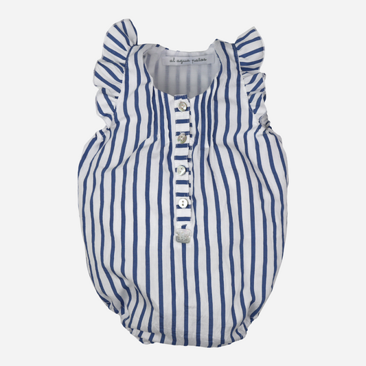 sold at Bombon shop, designed by Al Agua Patos brand, this blue and white striped romper for baby girls is perfect for spring and summer. front view