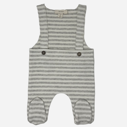 Sold at Bombon shop, designed by Tiny Soul — baby footed overall in grey and white stripes with buttoned shoulder straps and attached feet. front