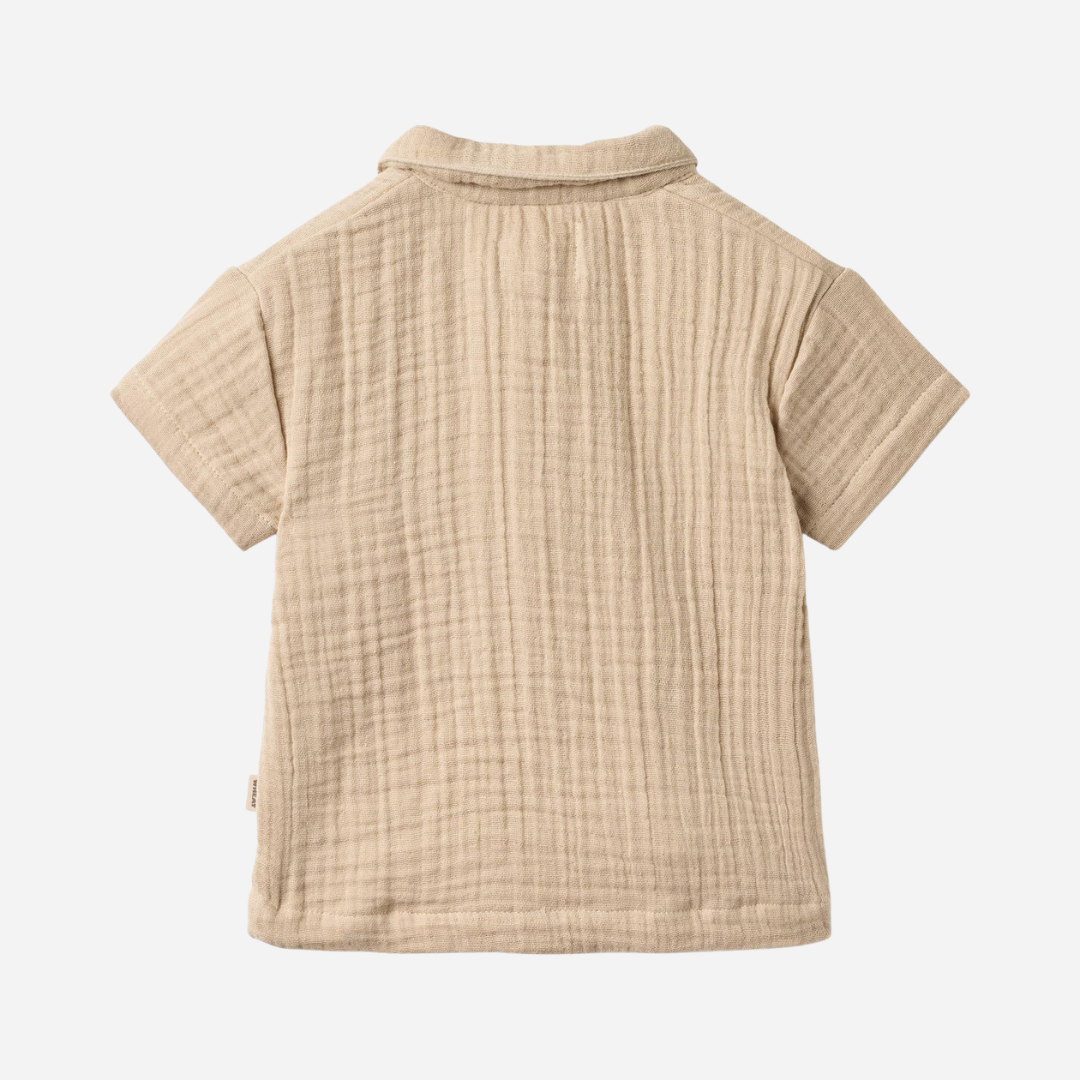 Sold at Bombon Shop, designed by Wheat, warm sand organic cotton short sleeve shirt with soft textured fabric and classic collar.