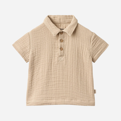 Sold at Bombon Shop, designed by Wheat, warm sand organic cotton short sleeve shirt with soft textured fabric and classic collar.
