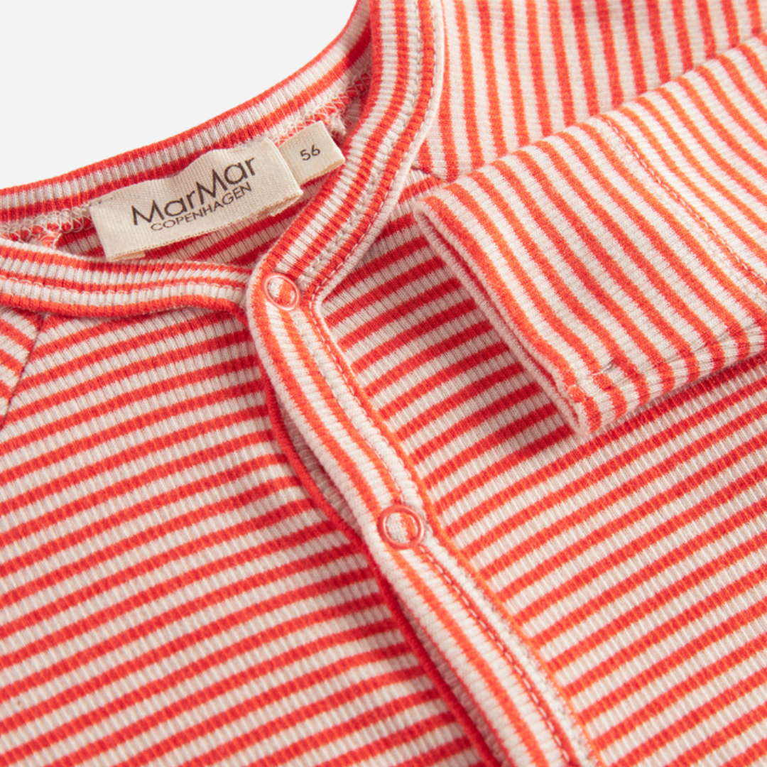 Sold at Bombon shop, designed by MarMar Copenhagen. Coral and cream striped baby cardigan with snap buttons, pairs perfectly with the matching coral striped footed pants.
