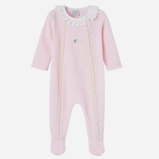 Sold at Bombon shop, designed by Paz Rodriguez. Baby girl footed velour jumpsuit in blush pink with ivory lace trim and ruffled collar.