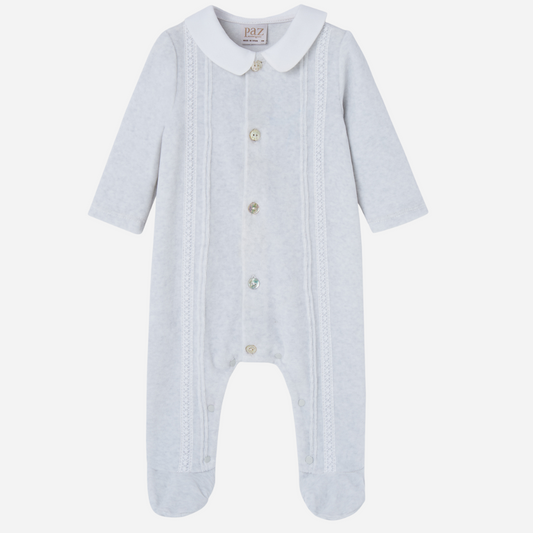 Sold at Bombon shop, designed by Paz Rodriguez. Light grey velour baby jumpsuit with white collar, lace detailing, and front button closure.